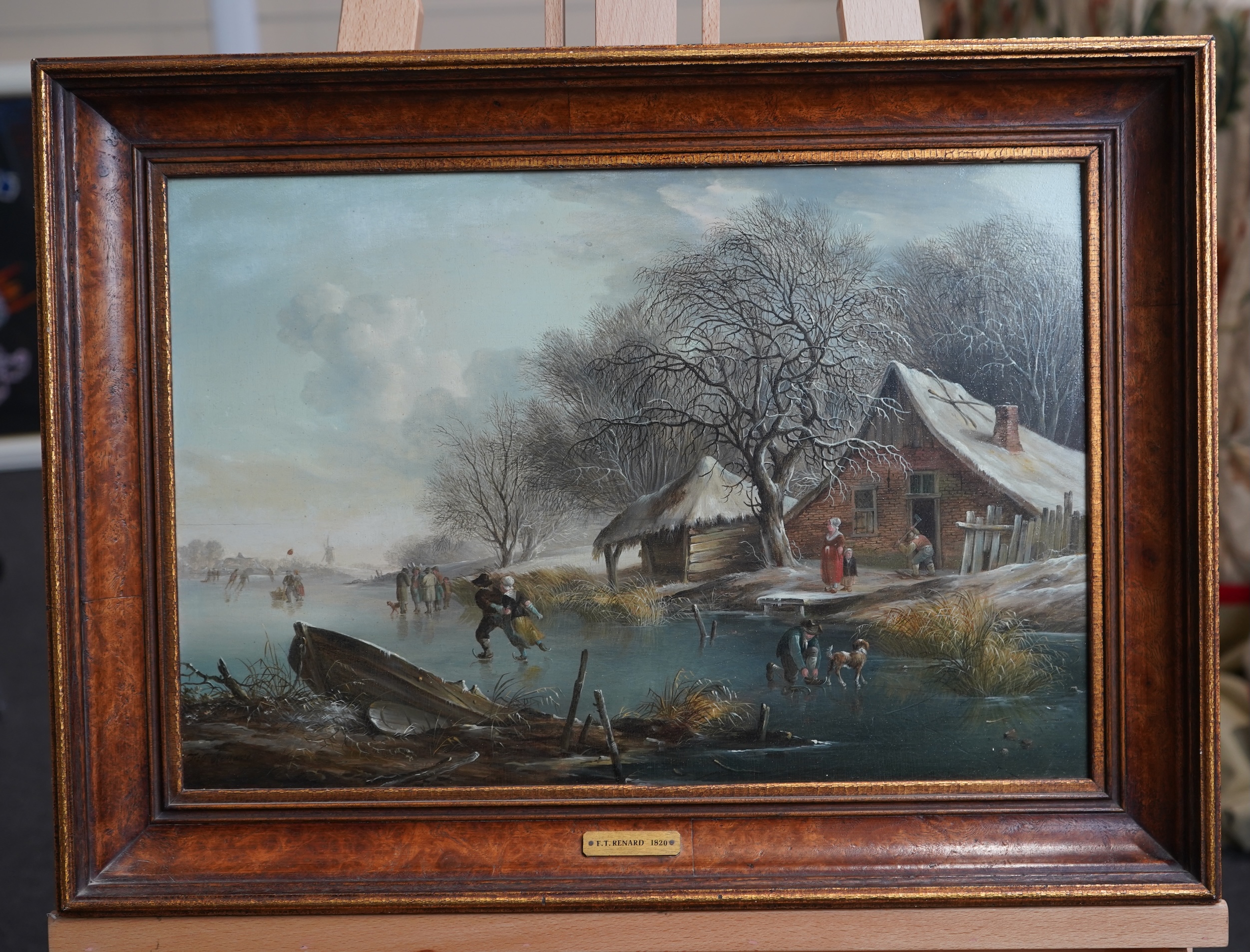 Fredericus Theodorus Renard, Dutch 1778-1820, A Winter landscape with figures skating on a frozen canal